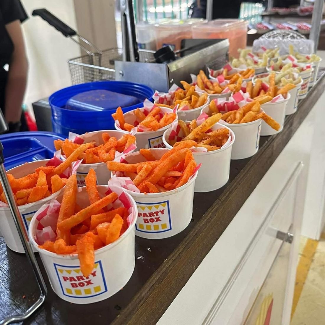 Seasoned fries in PartyBox branded cups